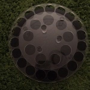 Spinning lipstick holder